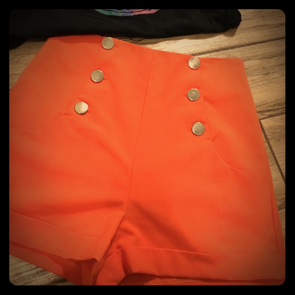 Orange high waisted shorts